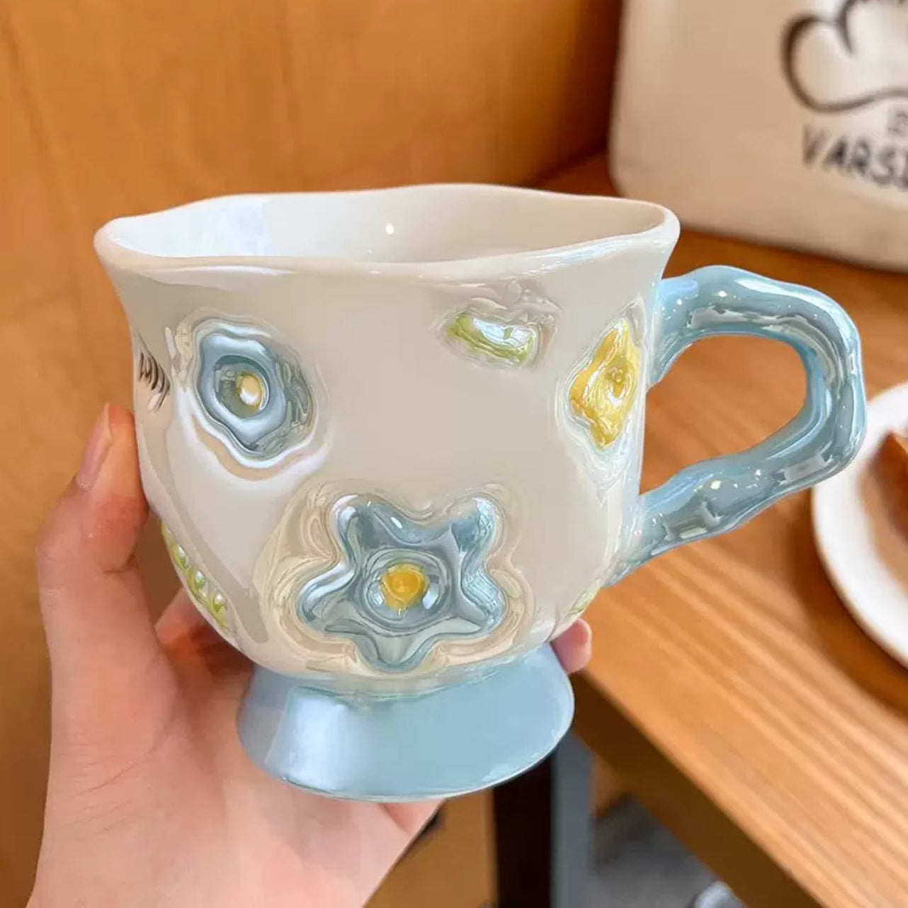 Embossed Flower Footed Mug