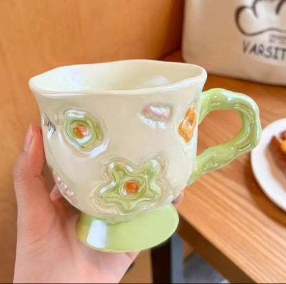Embossed Flower Footed Mug